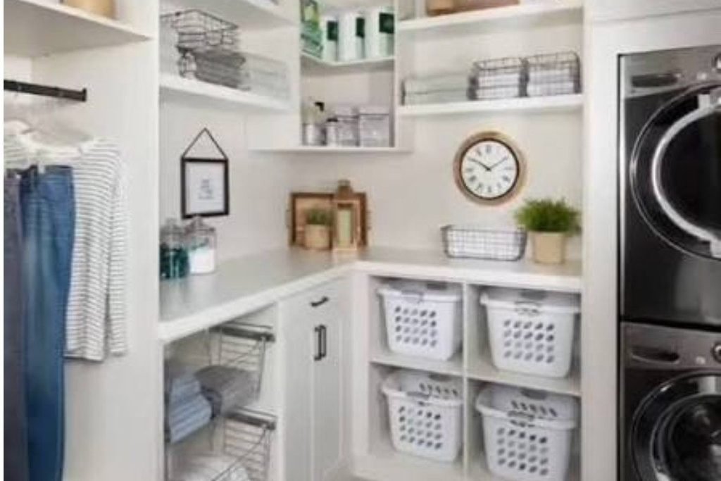 Winter-ready laundry room with stacked washer dryer and folded blankets